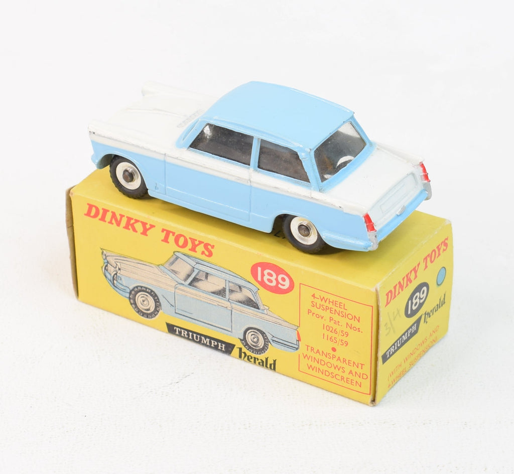 DINKY TOYS 189 : Triumph Herald, blanche et bleue, éclats de - Lot 299