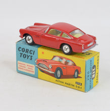 Corgi toys 218 Aston Martin D.B.4 Virtually Mint/Nice box (shaped hubs/closed vent)