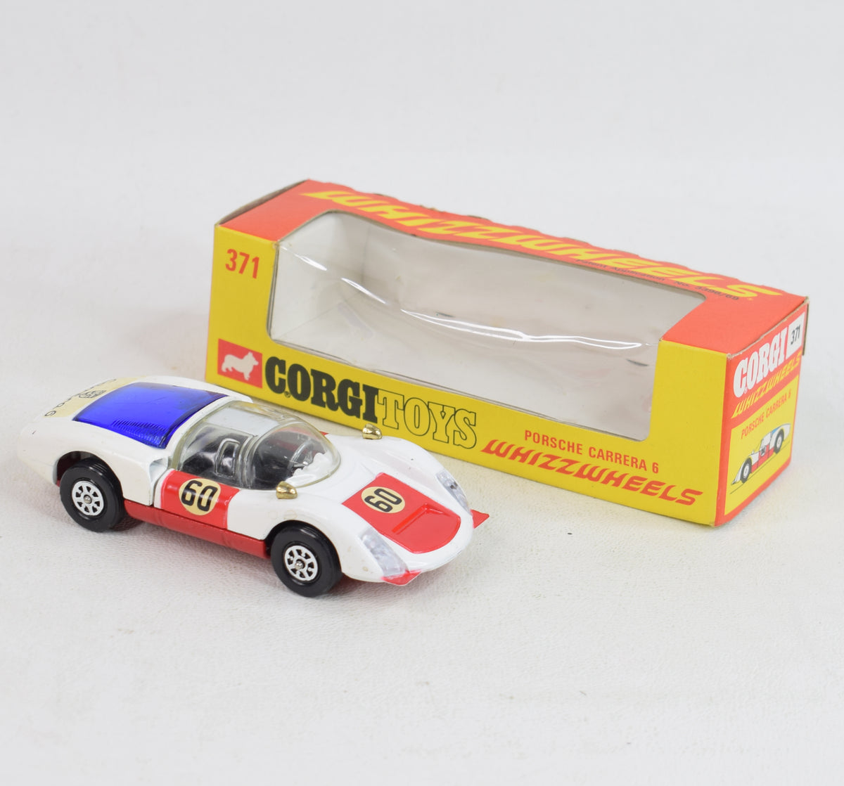 Corgi toys 371 Porsche Virtually Mint/Nice box (dark blue engine cover)