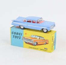 Corgi toys 220 Chevrolet Impala Virtually Mint/Nice box (Shaped hubs, red int)
