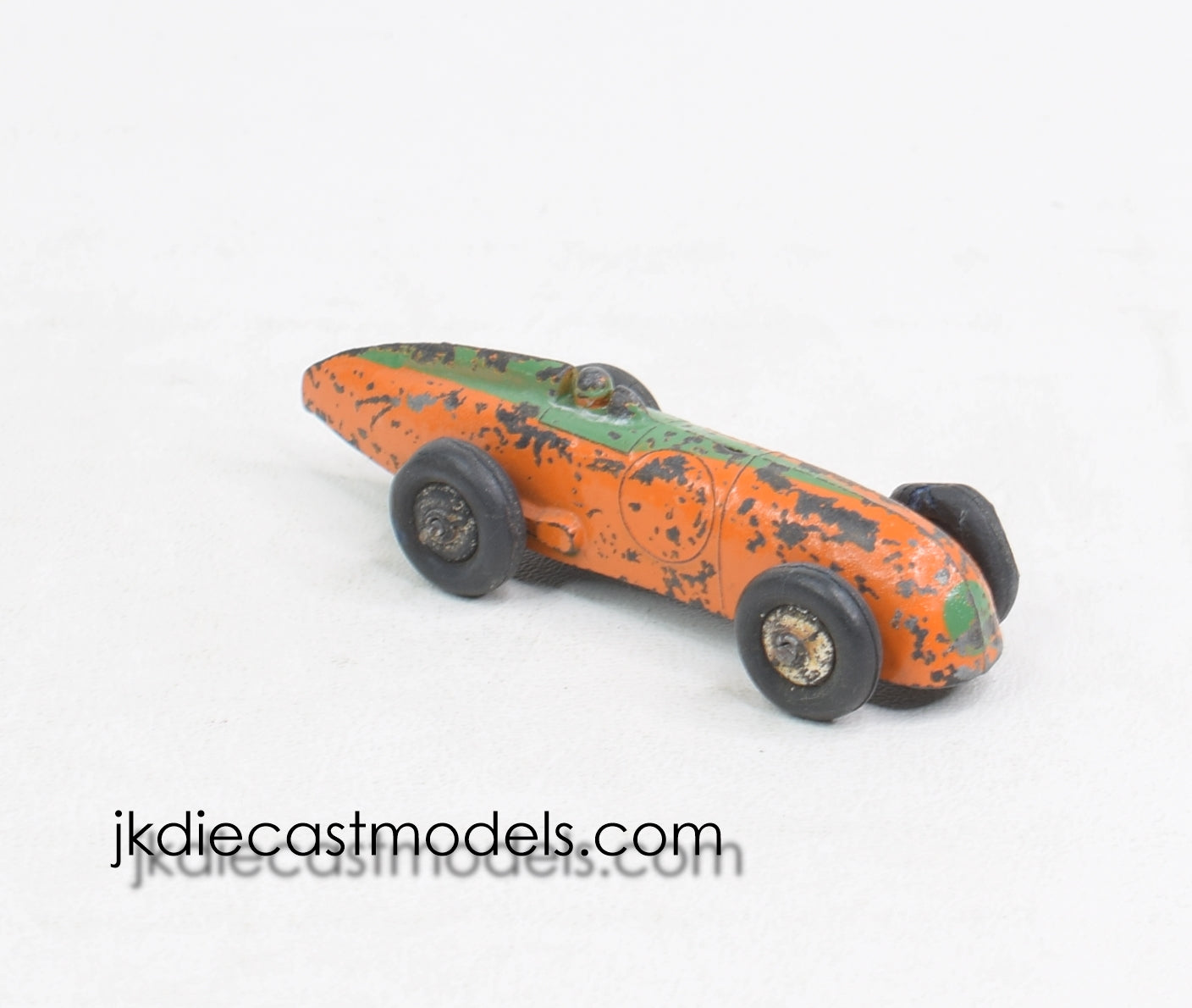 Six Dinky Toys cars, comprising a post-war No. 23a racing car, a No Six Dinky Toys cars, comprising a post-war No. 23a racing car, a No