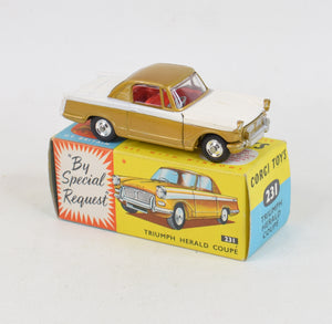 Corgi toys 231 Triumph Herald Virtually Mint/Nice box (shaped hubs)