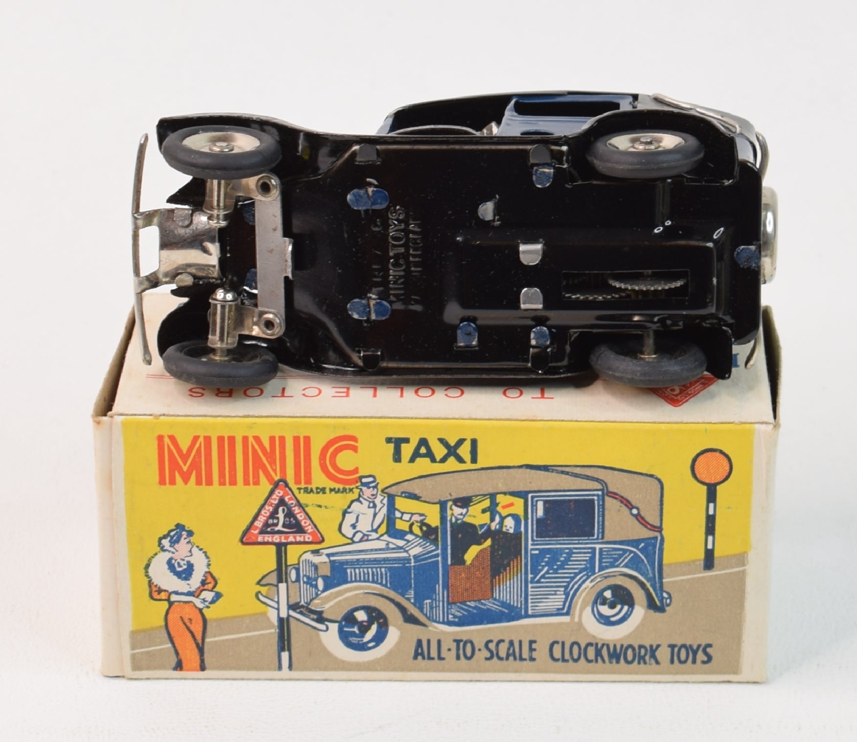 Taxi Tri-ang Minic Ailways N°2 - 1950, Moteur à Clé, Plastique Jaune 17 Cm, RARE