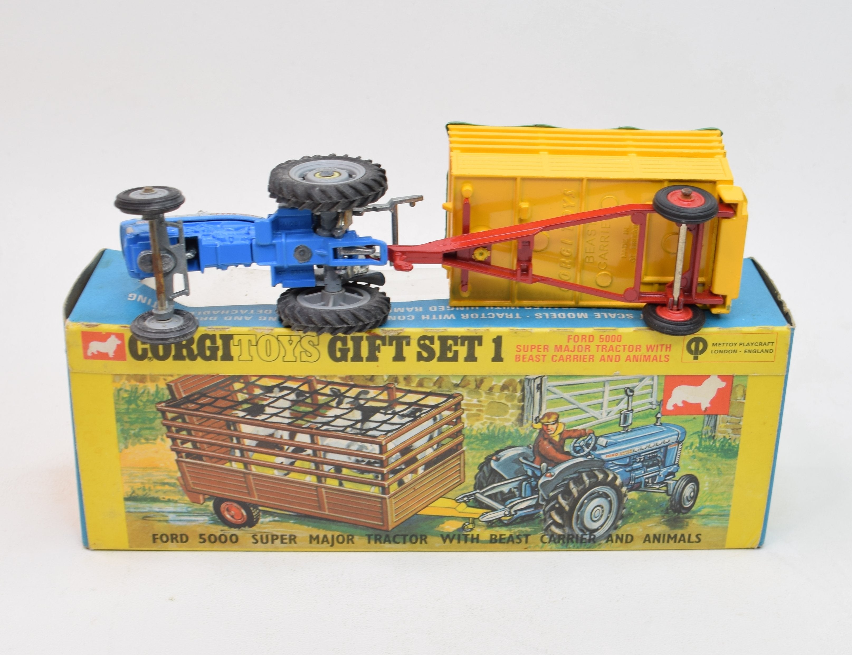 Four Corgi Toys farm items, comprising a Gift Set No. 13 Fordson Power Major tra Four Corgi Toys farm items, comprising a Gift Set No. 13 Fordson Power Major tra