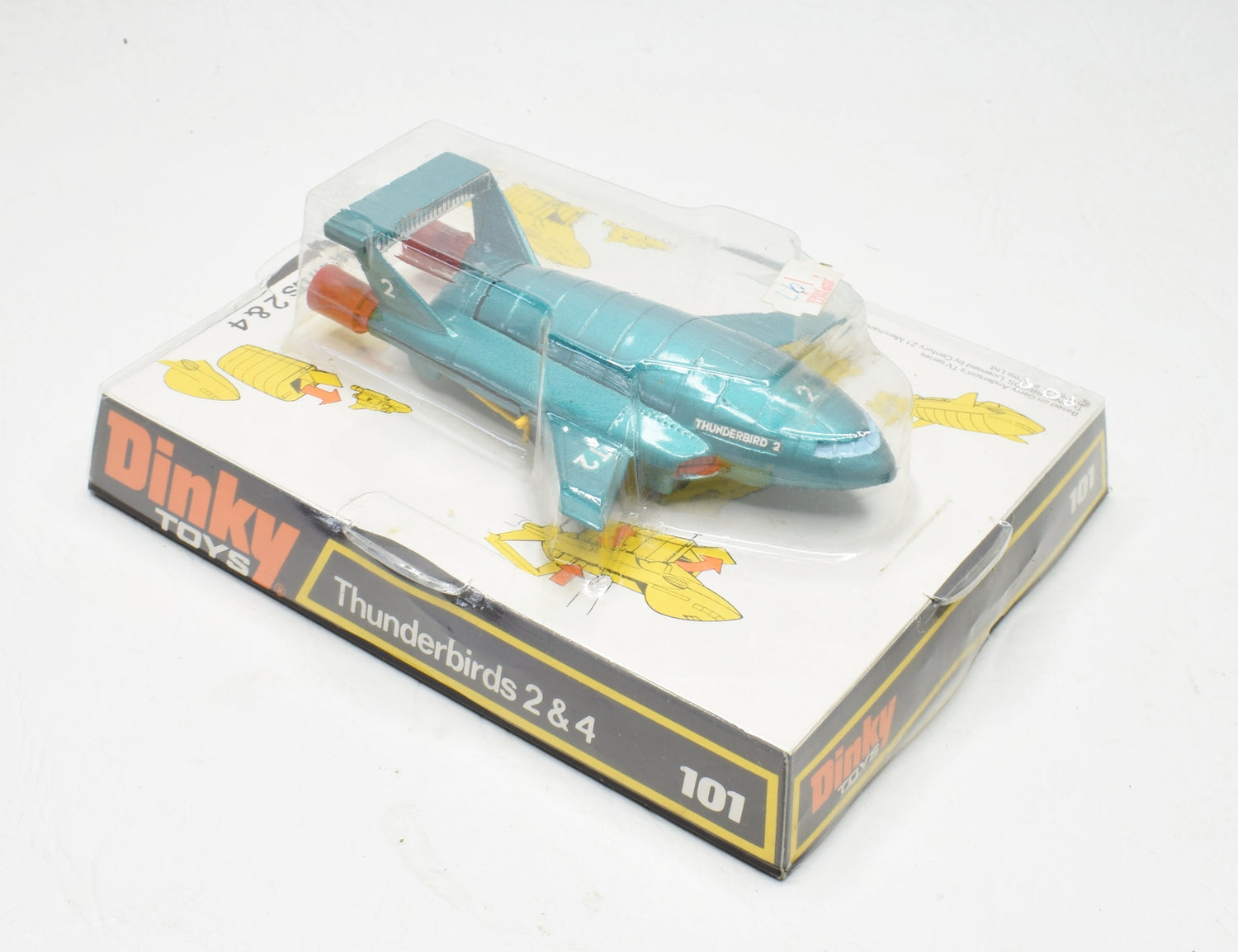 Dinky toy 101 Thunderbird 2 + 4 Virtually Mint/Boxed (White & yellow plinth)