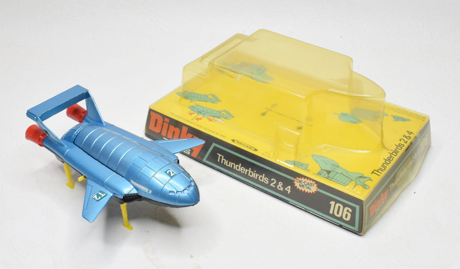 Dinky toy 106 Thunderbird 2 + 4 Very Near Mint/Boxed (Yellow plinth & black base) 'The Lane' Collection