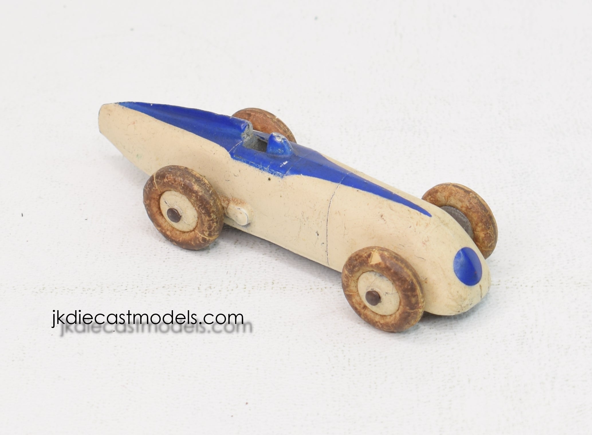 Four Dinky Toys racing cars, comprising a No. 23H Ferrari, a No. 23F Four Dinky Toys racing cars, comprising a No. 23H Ferrari, a No. 23F